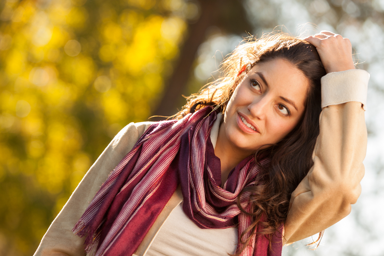 Young woman in suede jacket