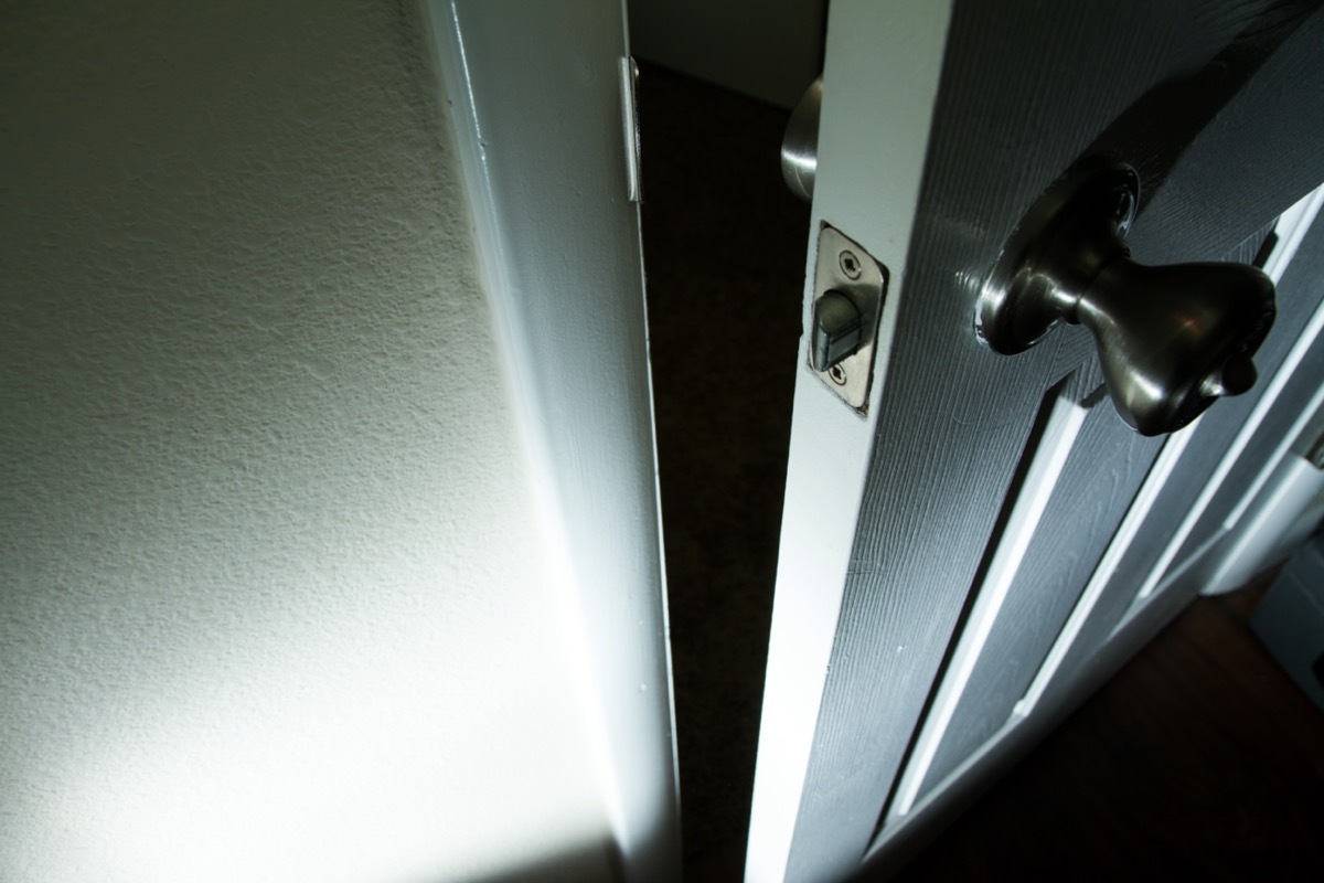 Closeup on door into dark room