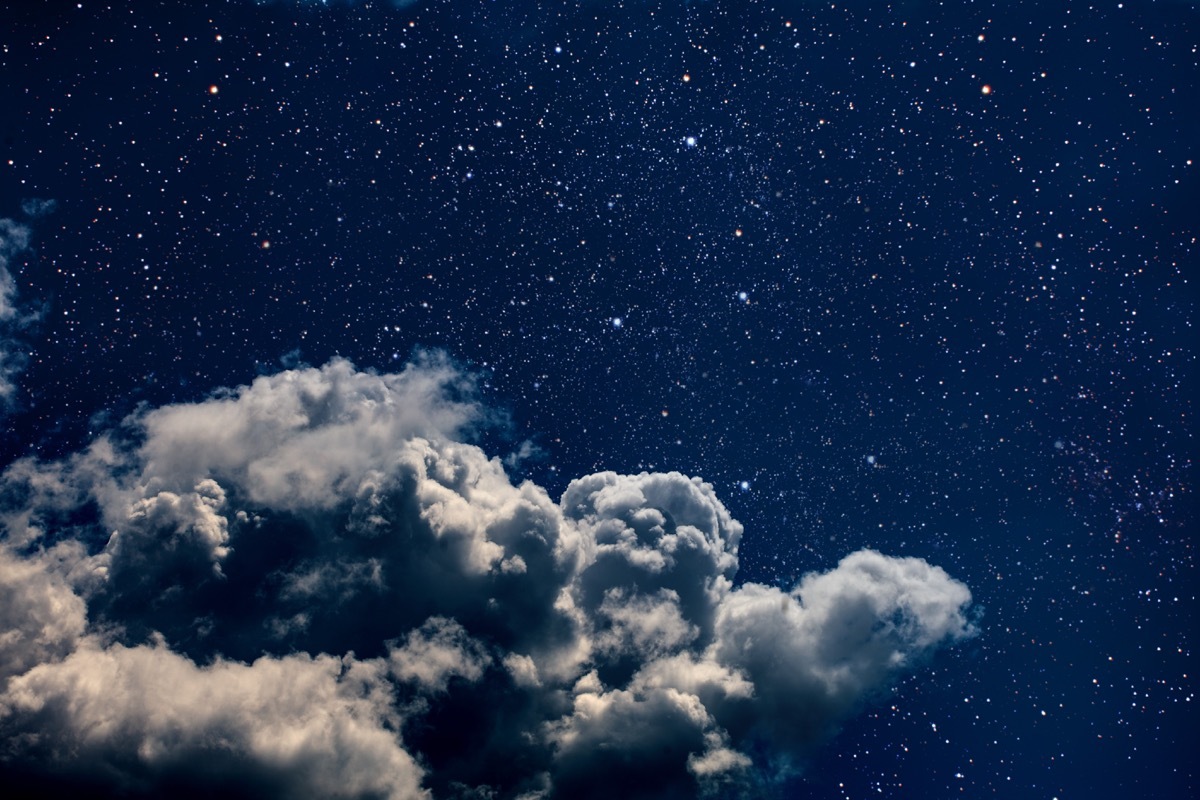 Clouds and stars in night sky