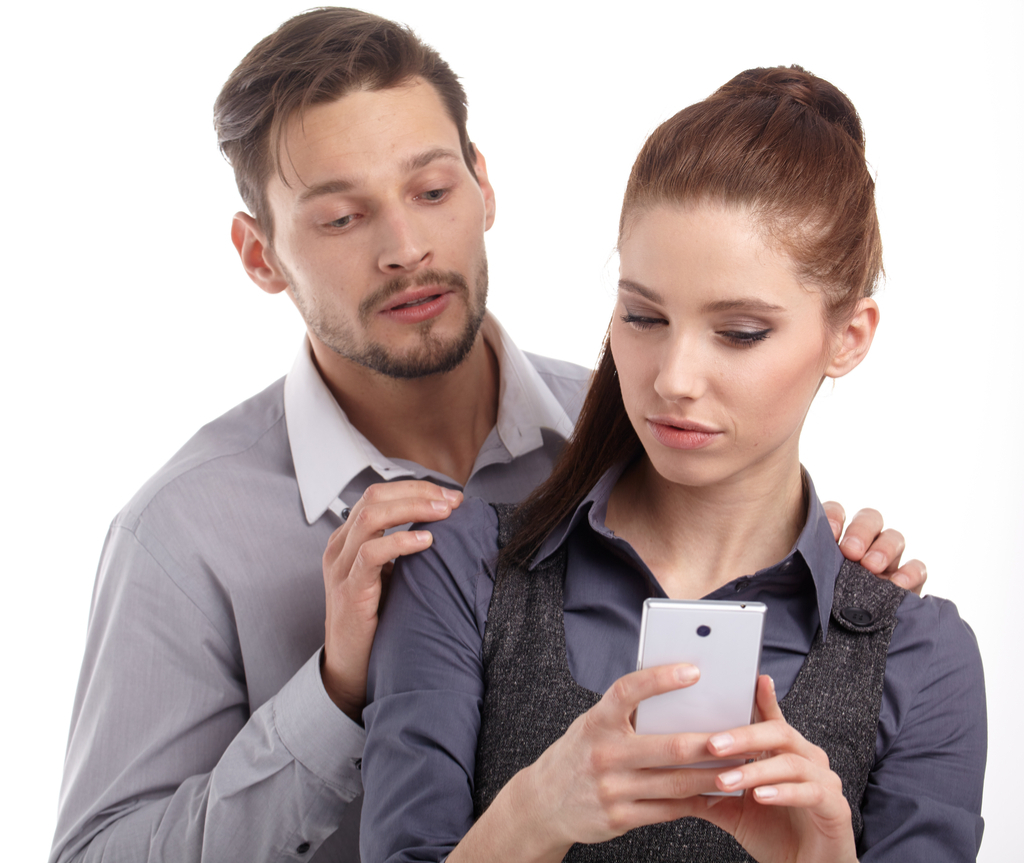 Couple Looking at Phone Romance