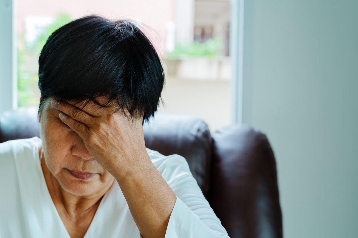 stressed woman sitting in a chair self-care tips