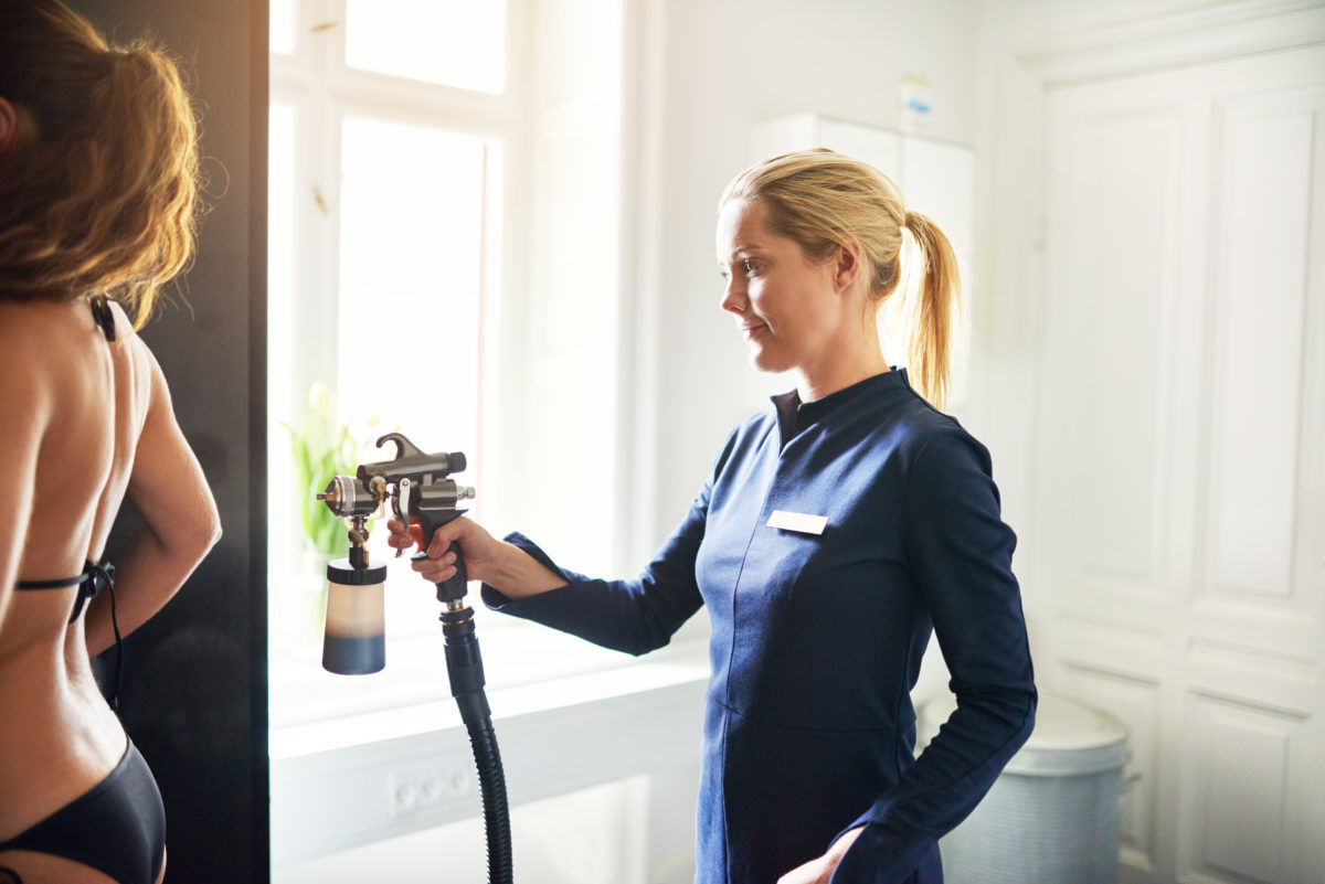 Woman Getting a Spray Tan - how to fight seasonal depression