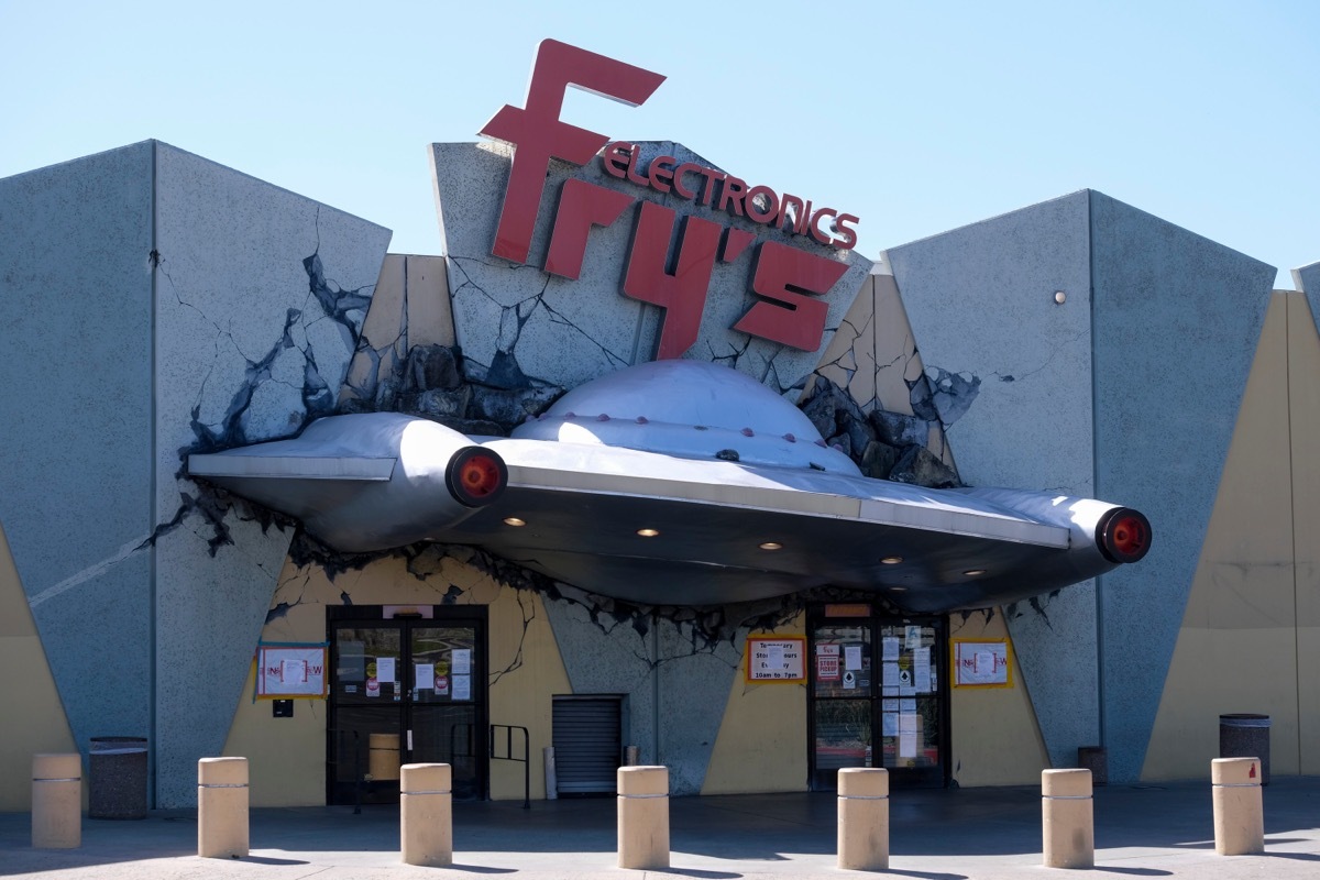 frys electronics exterior with space ship crashed into it