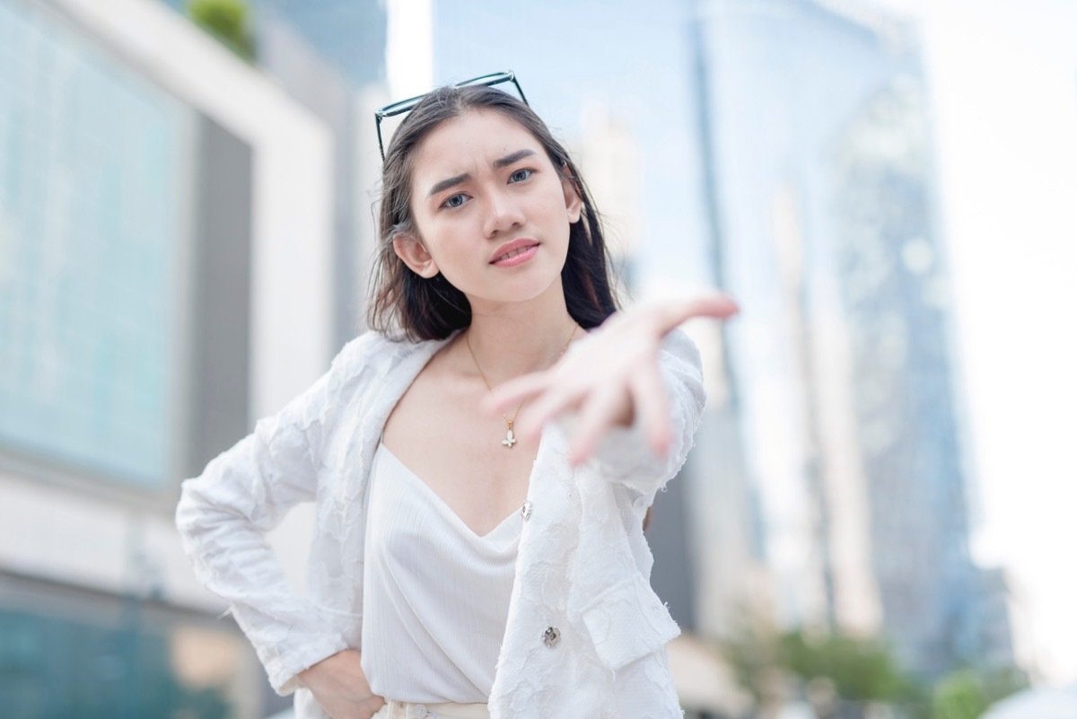 Young Woman Demanding Things