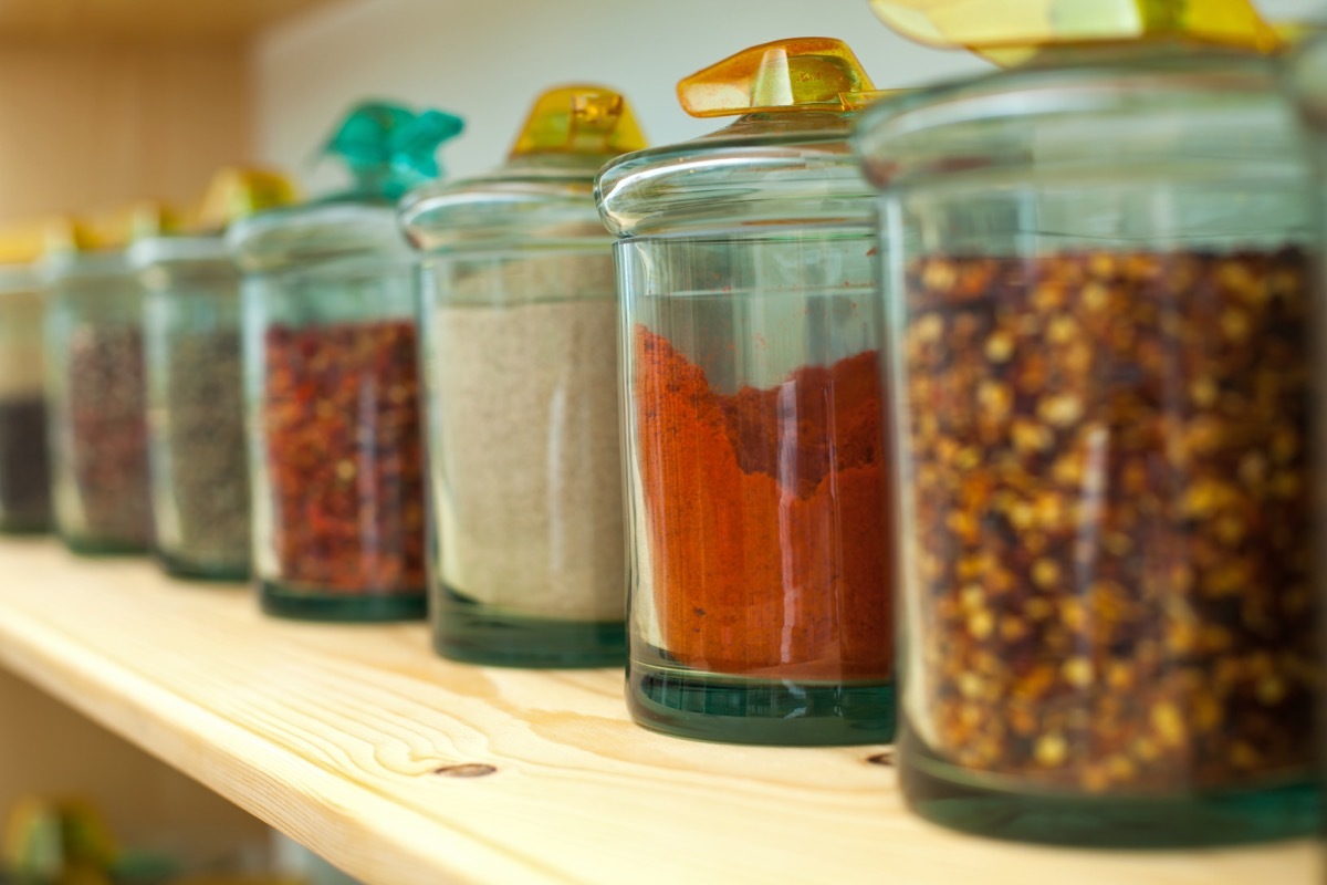 red spices in a cabinet