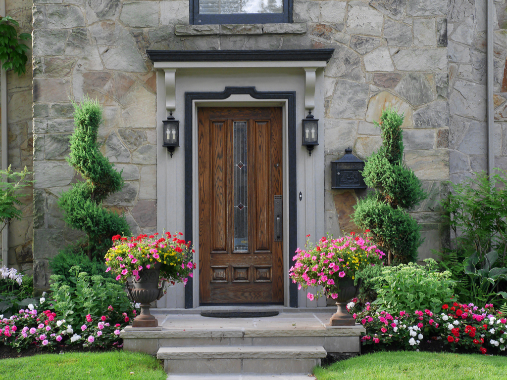 Home with Flowers Boosting Your Home's Curb Appeal