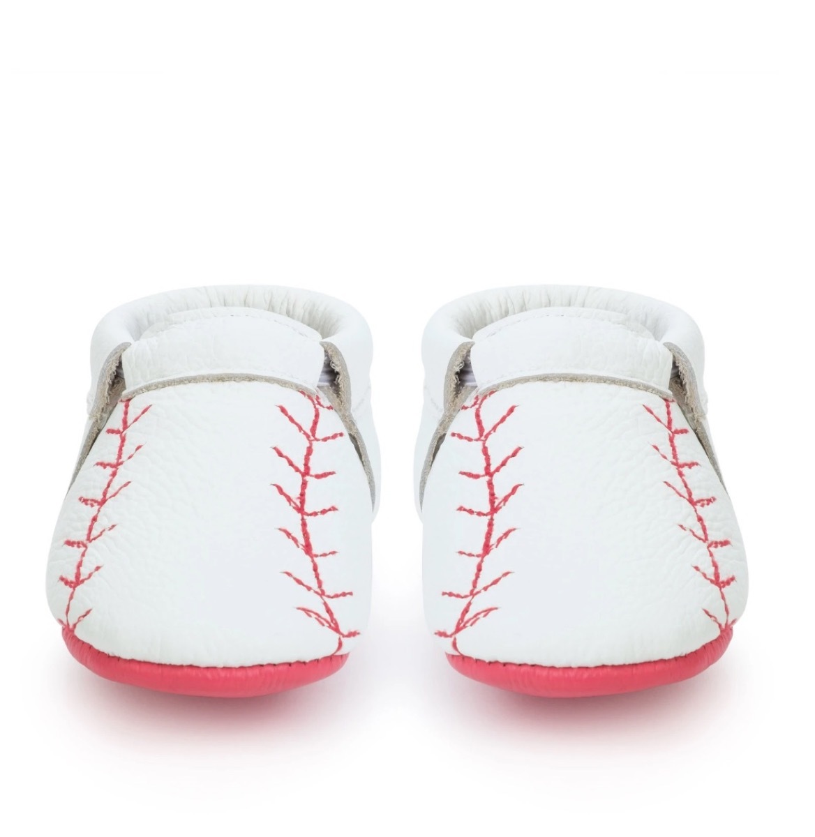 white baseball inspired baby moccasins with red stitching