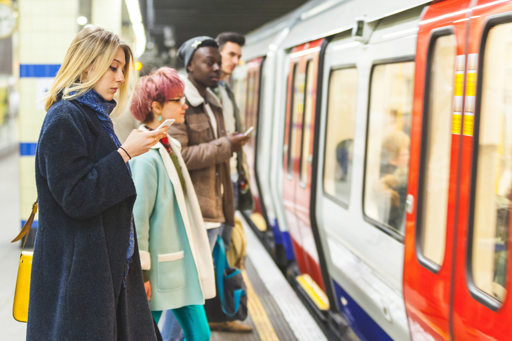 passengers waiting for trains