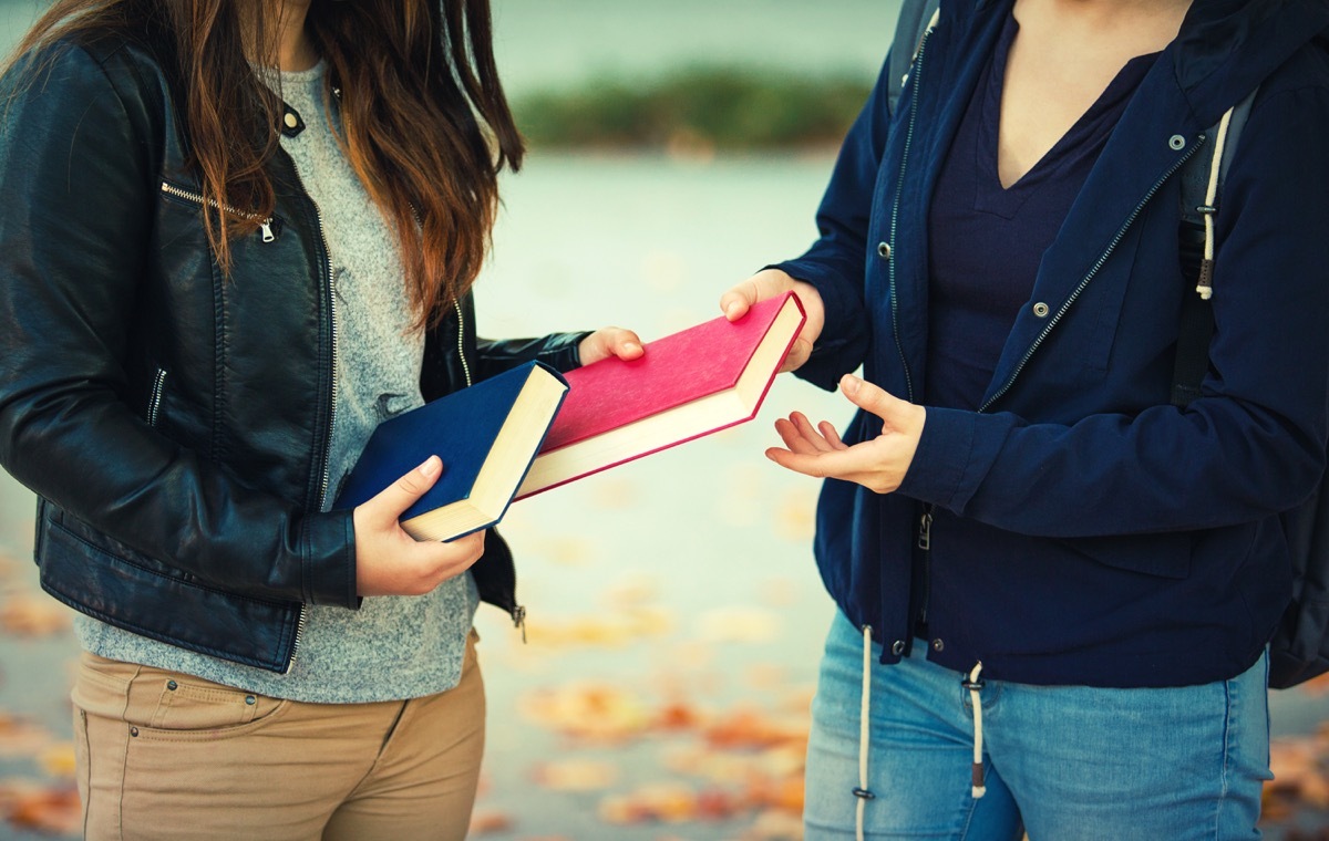 girls borrowing a book and exchanging it, old fashioned etiquette rules