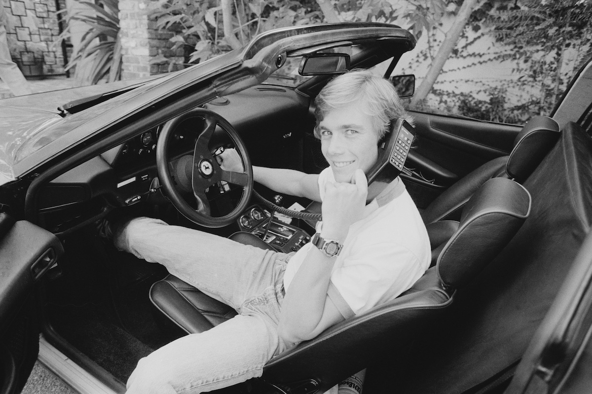 Christopher Atkins photographed in a car in 1983