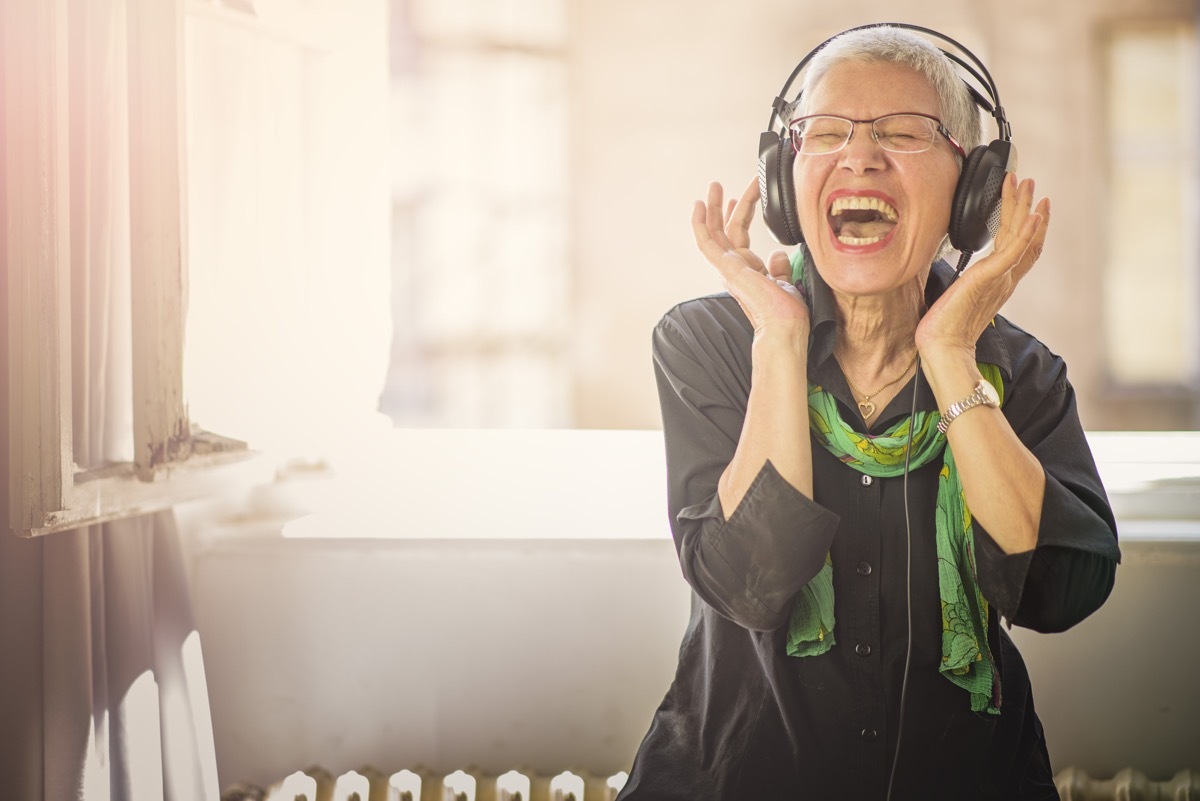 senior woman listening to music