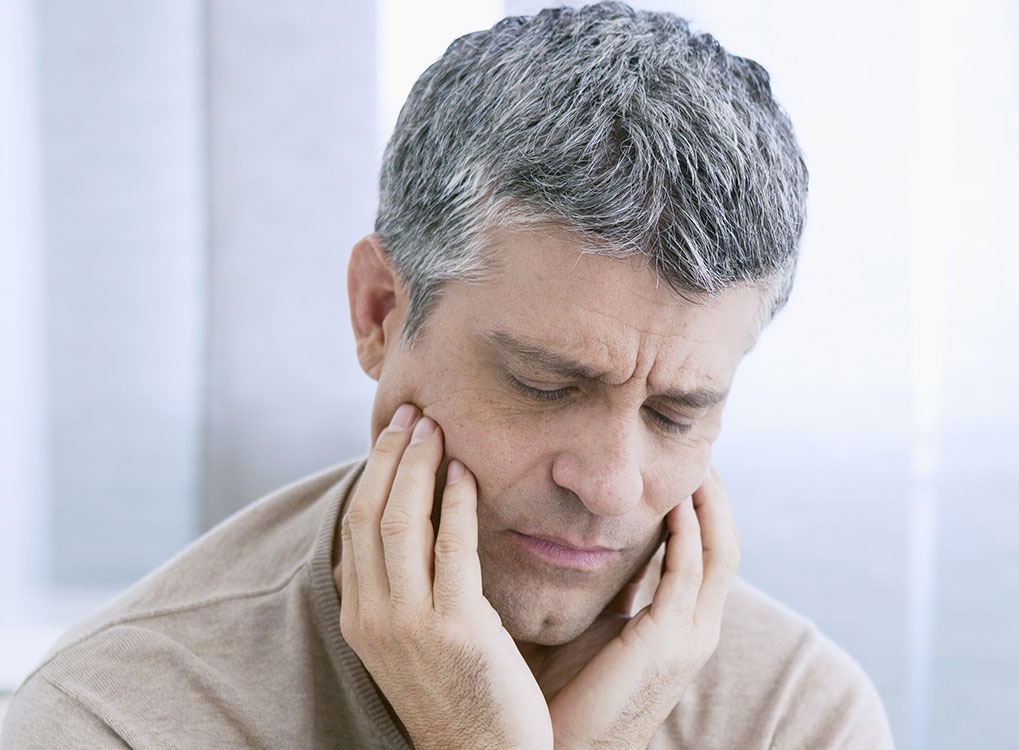 Man with Jaw Pain Dangerous Diet Fads