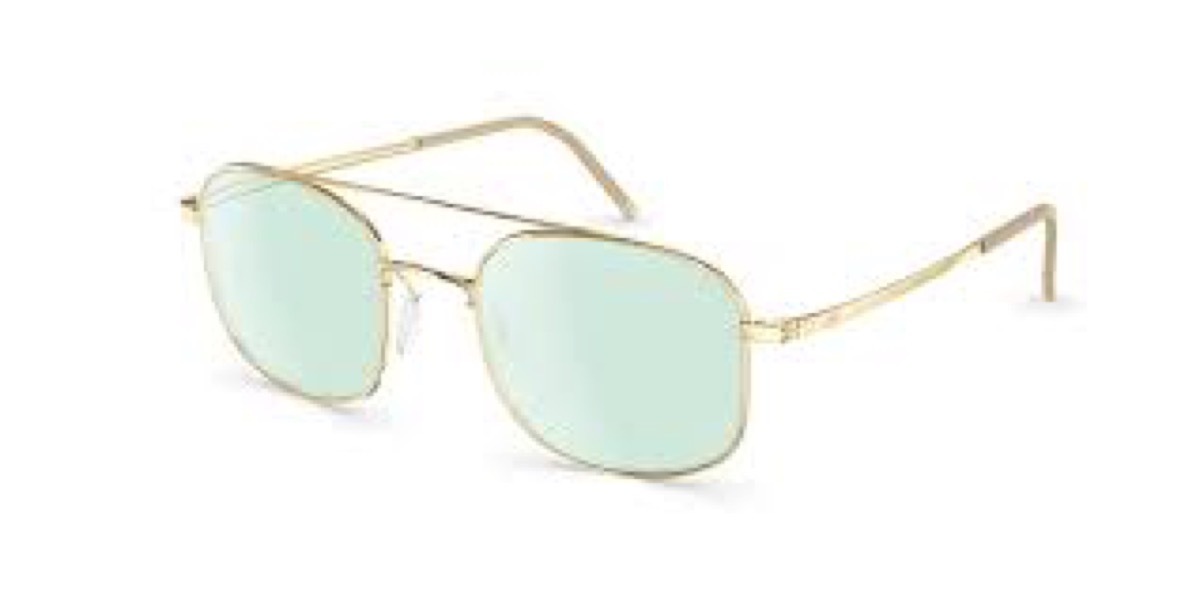 gold rimmed glasses with green lenses