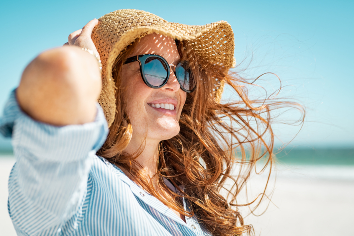 carefree woman on beach
