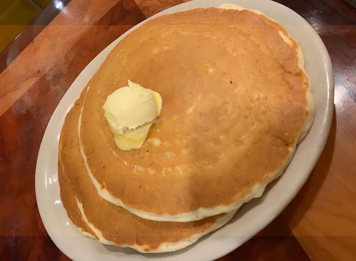 stack of pancakes with butter