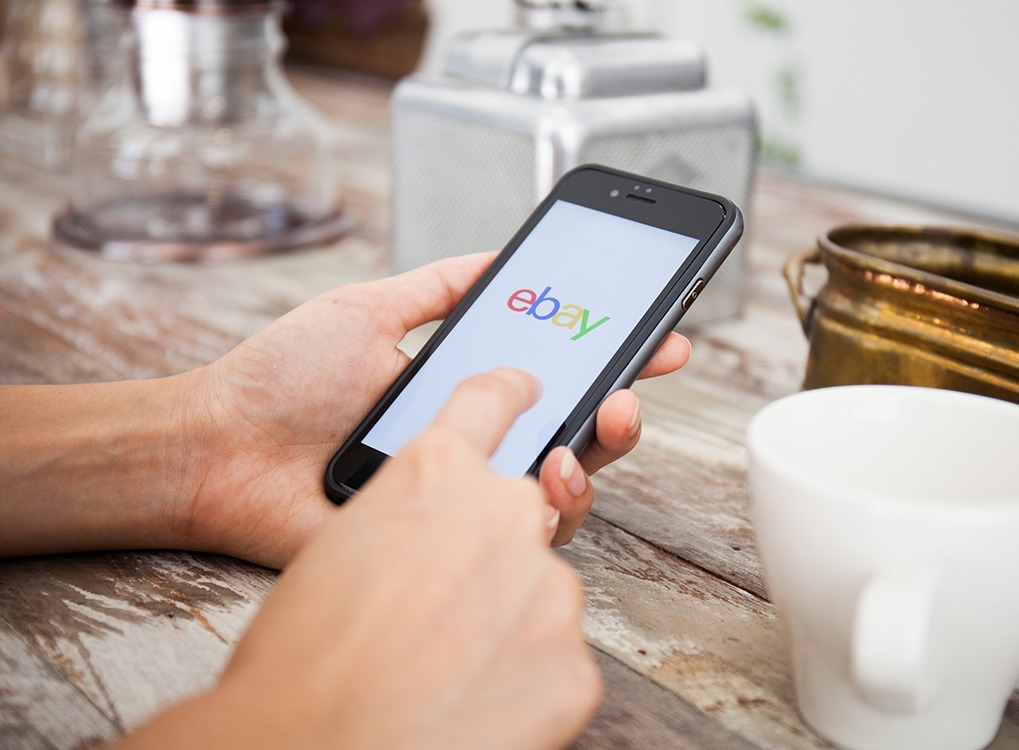 person using ebay on their phone