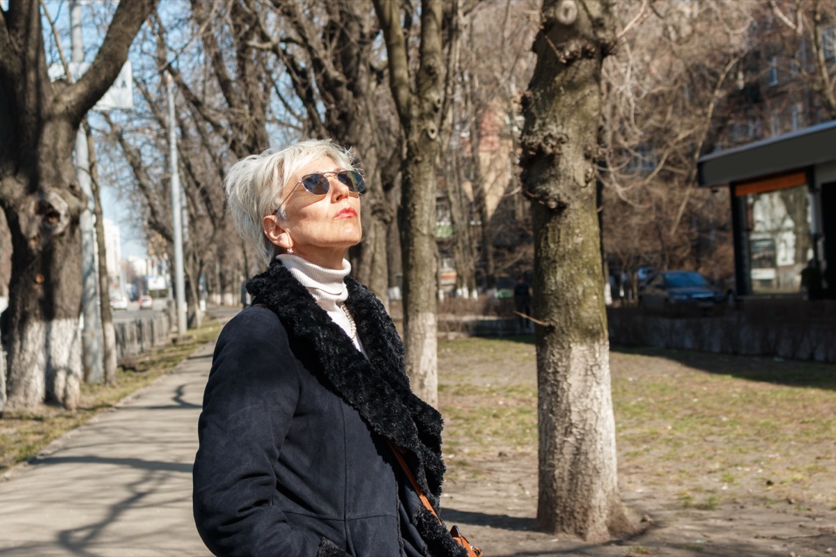 Older Woman Wearing Sunglasses Outside Habits after 40