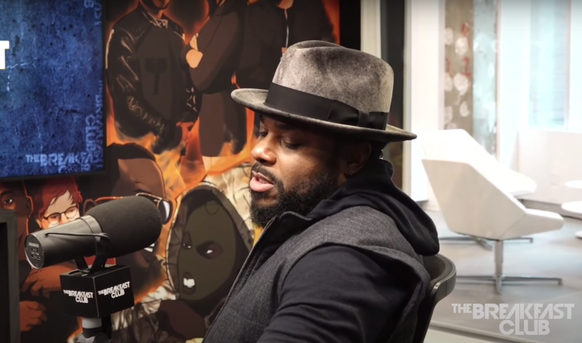 Malcolm-Jamal Warner being interviewed by