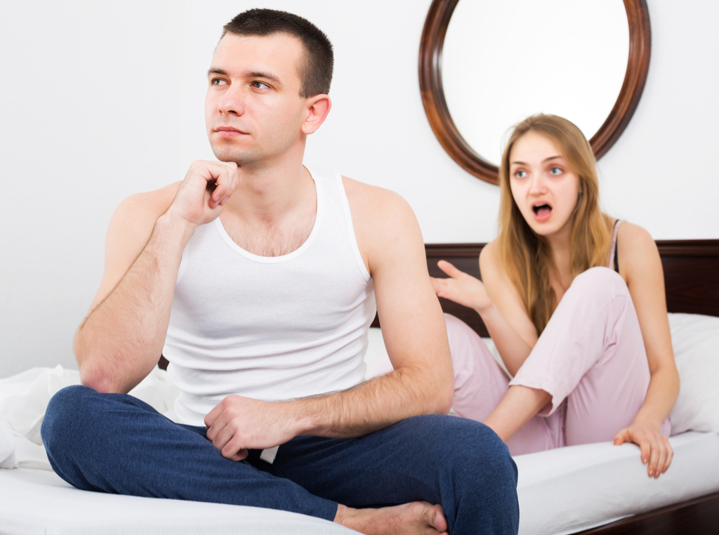 Man Biting His Tongue in Argument Romance