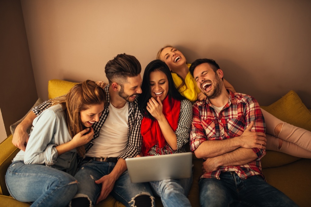 friends laughing together crazy health benefits of laughter