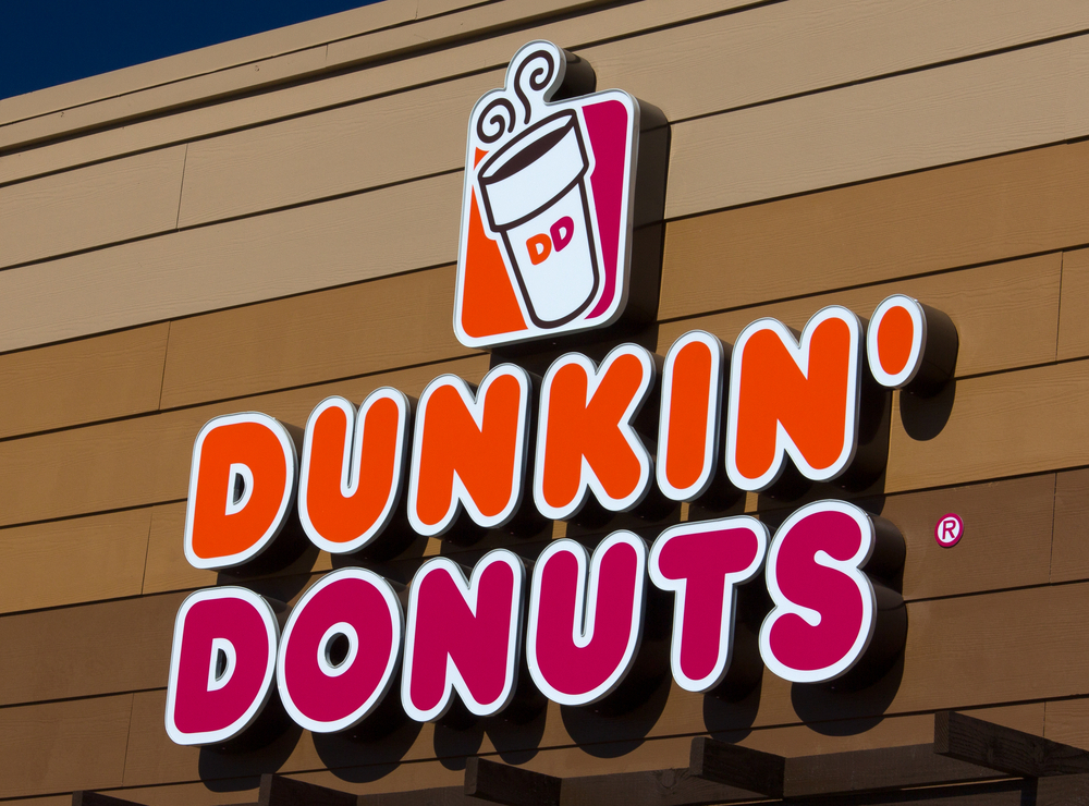 The exterior signage of a Dunkin' Donuts location