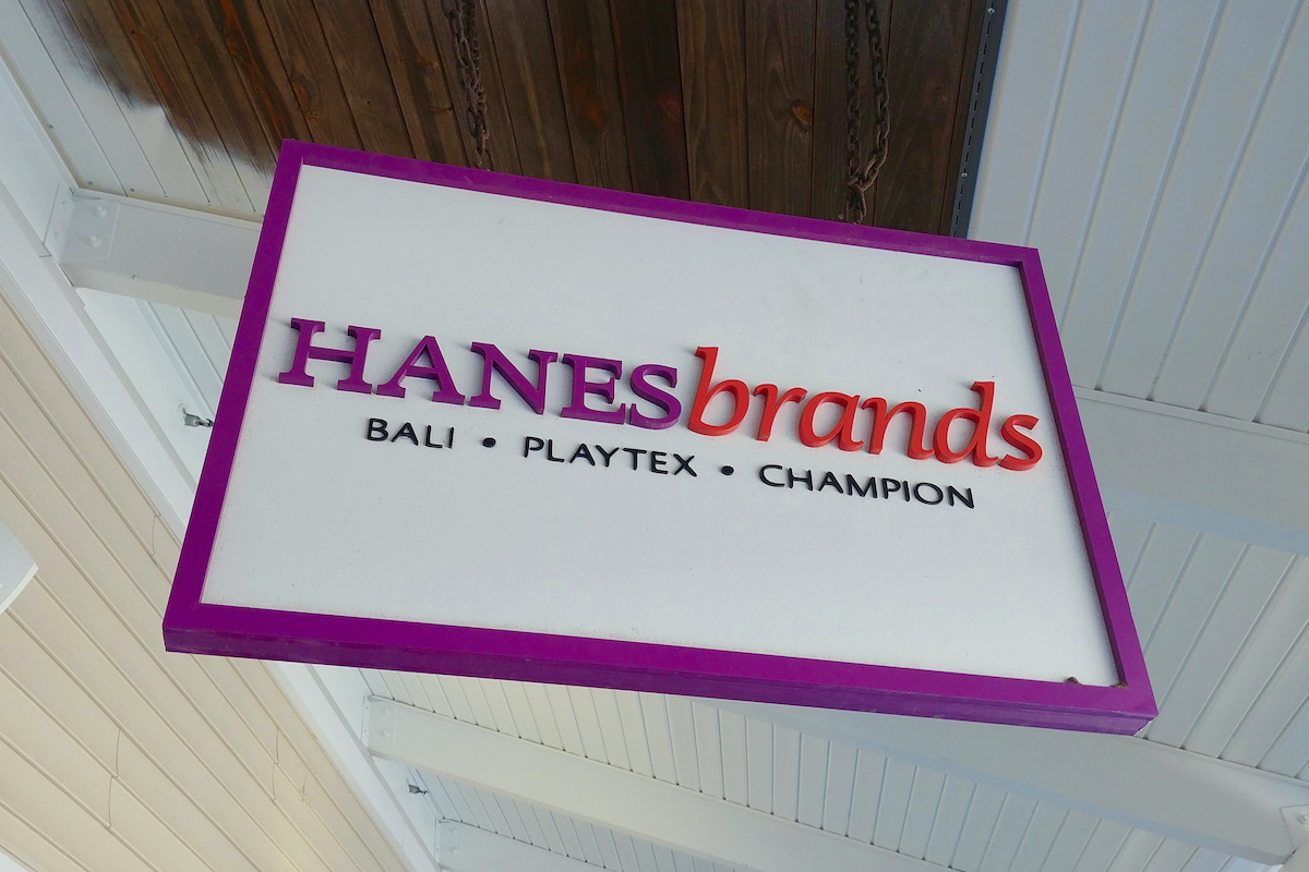 Sign for the Hanes Brands store at Wrentham Village Premium Outlets in Wrentham, Massachusetts