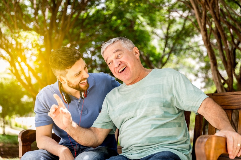 dad and son laughing crazy health benefits of laughter