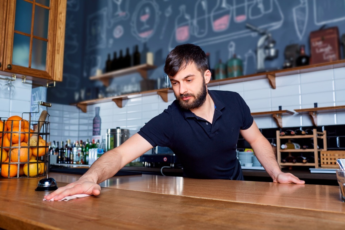Barista Wiping Down Counter