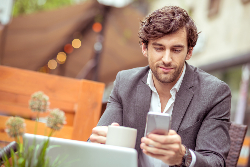 Guy on Phone Smiling 2018 predictions