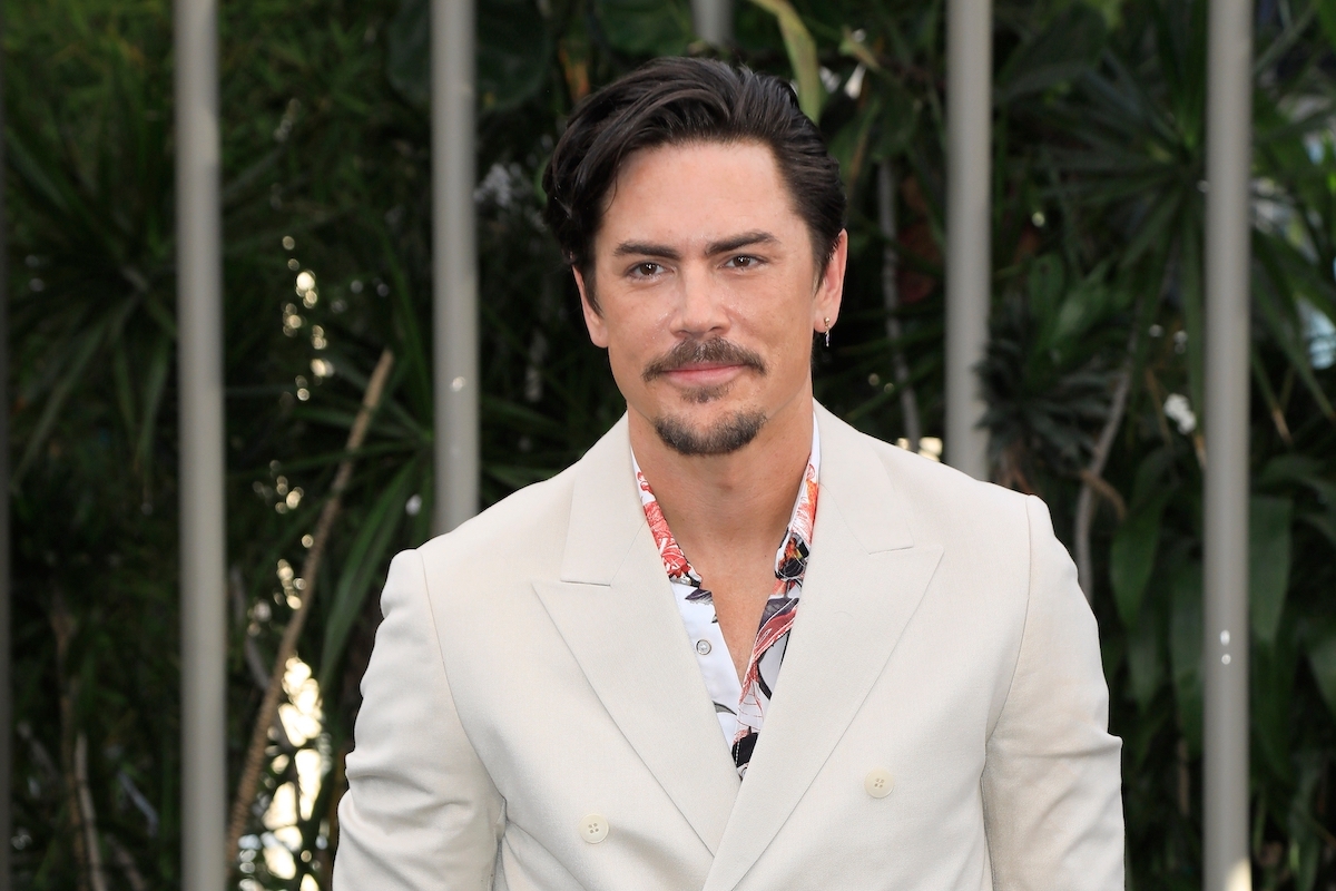 Tom Sandoval wearing a white blazer
