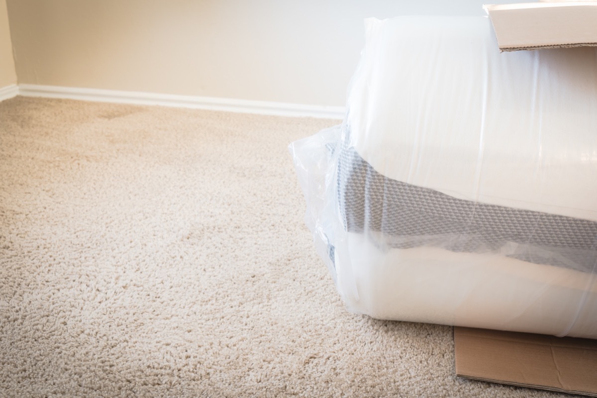 boxed mattress on the floor