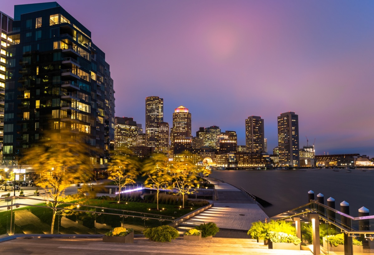 Night view of Boston skyline and watefront on a windy day