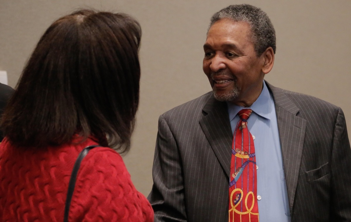 Dr. Frank Smith civil rights activist, historian, politician, museum founder, and keynote speaker at the Naval Surface Warfare Center Dahlgren Division sponsored 2018 African-American and Black History Month Observance talks with a member of the audience after his keynote speech about the history and heroes of American civil rights and the Civil War. The civil rights activist is most recognized as the first person associated with the Student Nonviolent Coordinating Committee who registered voters in Mississippi.