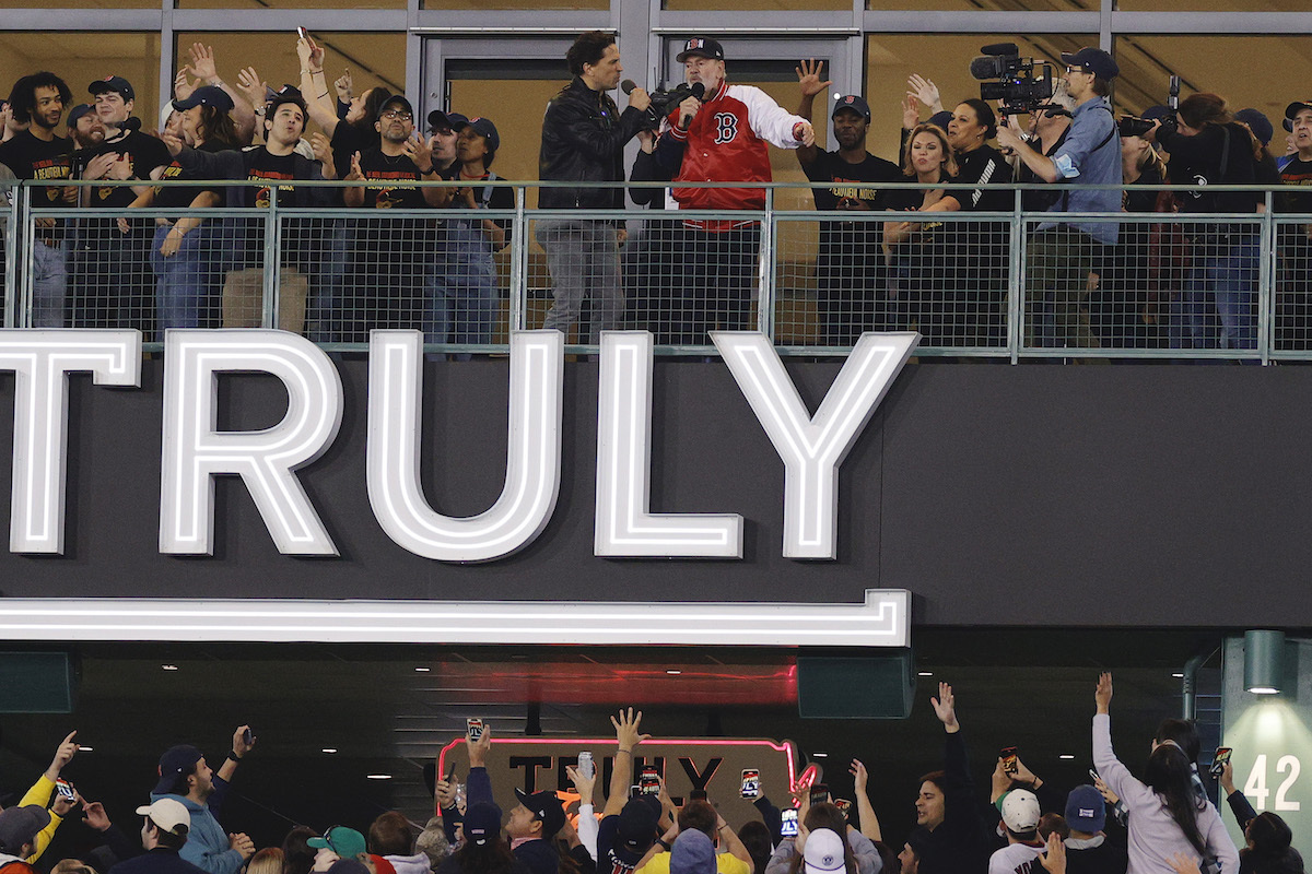 Will Swenson and Neil Diamond performing at Fenway Park on June 18, 2022