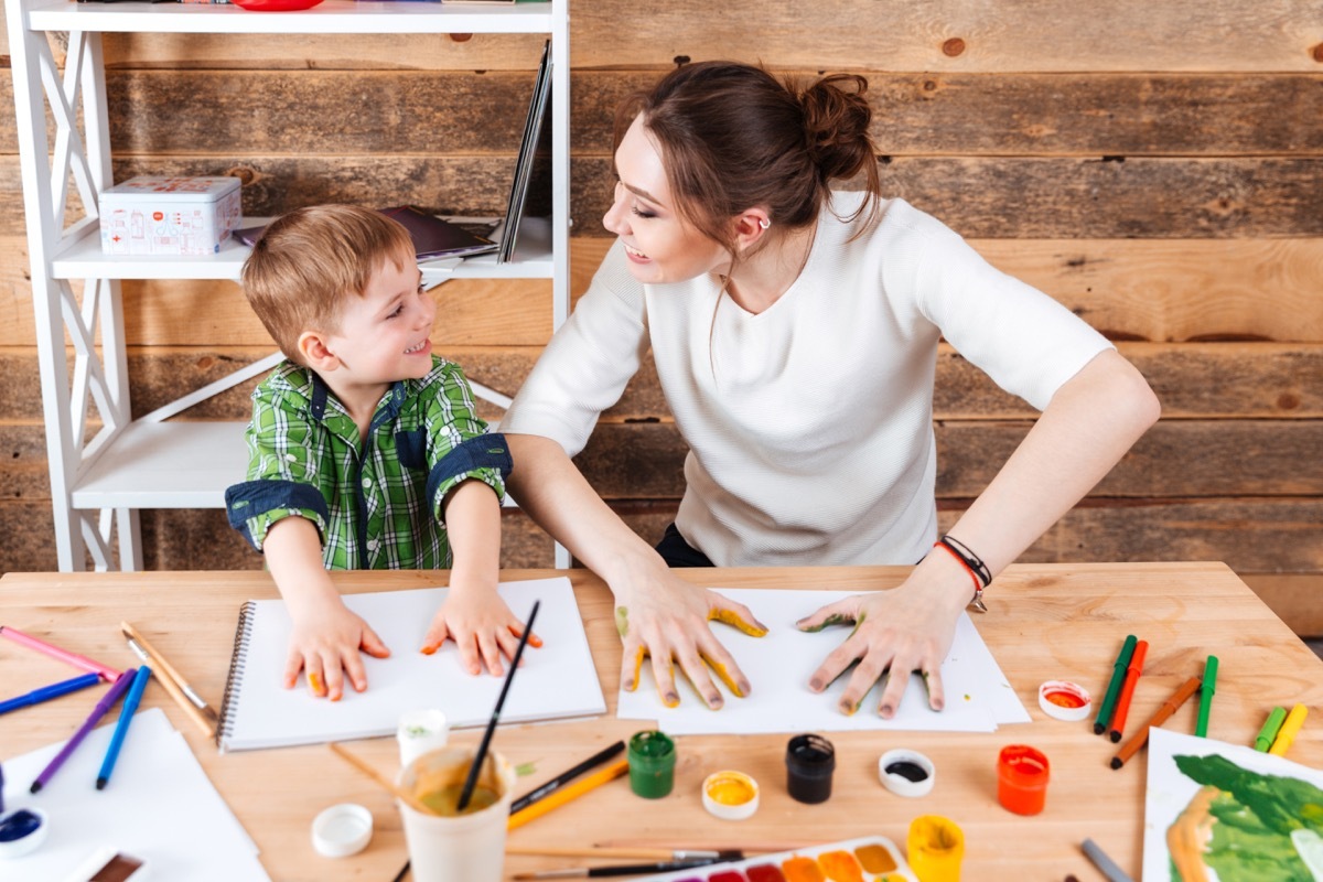 mother and son finger painting