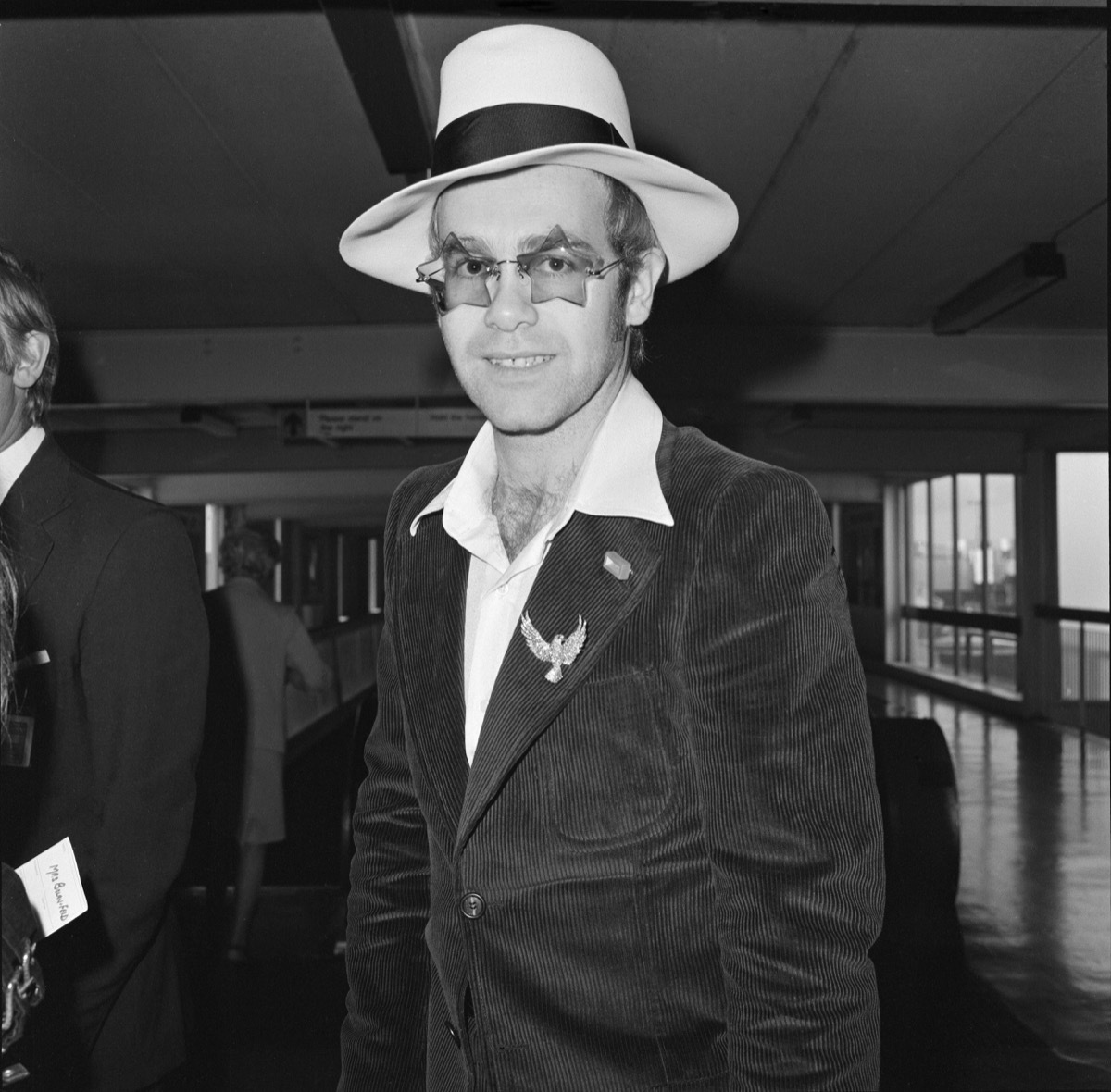 Elton John leaves Heathrow Airport. He is going to Los Angeles for the party of Elton John's Manager. Picture taken 9th September 1974