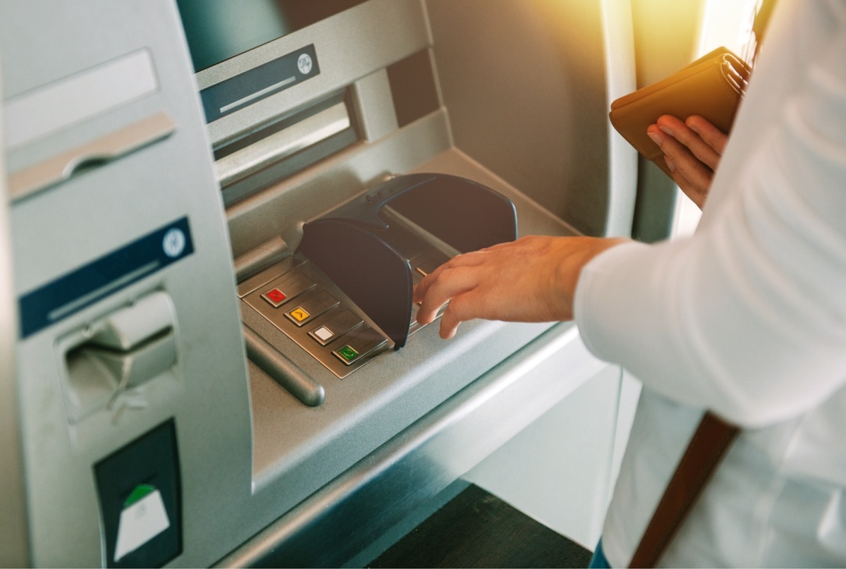 Person using ATM