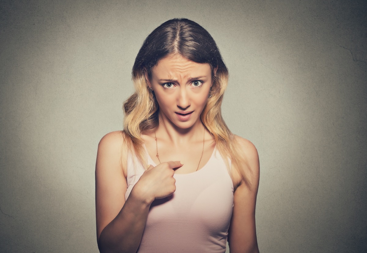 woman pointing to herself