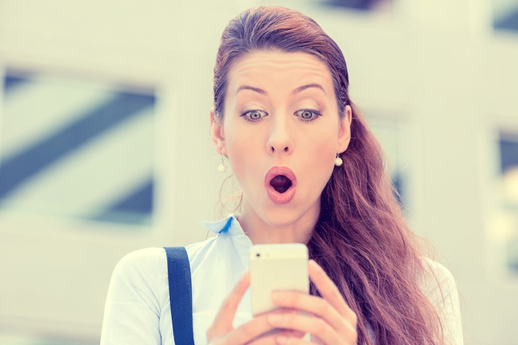 woman surprised anxious on her phone funny things people do