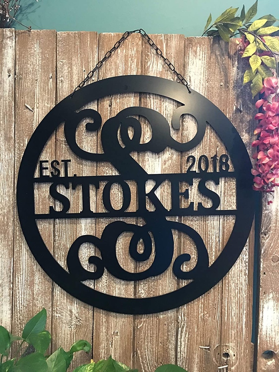 black home sign reading