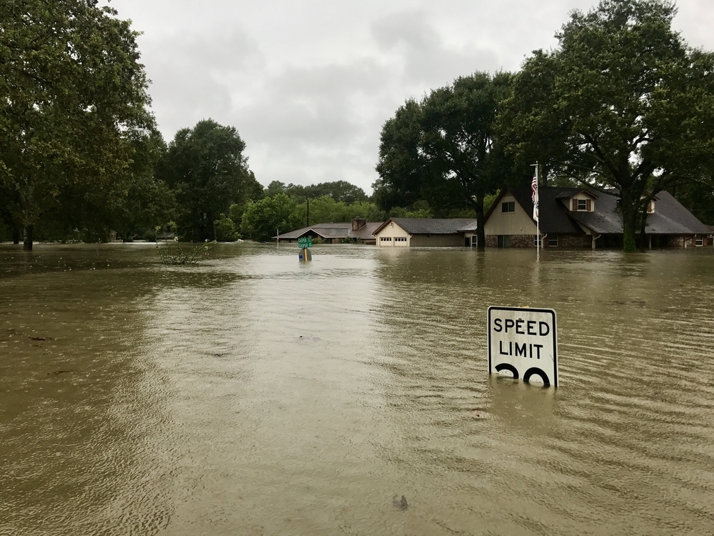 Hurricane Harvey 2017, flooding in Spring Texas, a couple miles north of Houston. Speed limit sign almost completely submerged.
