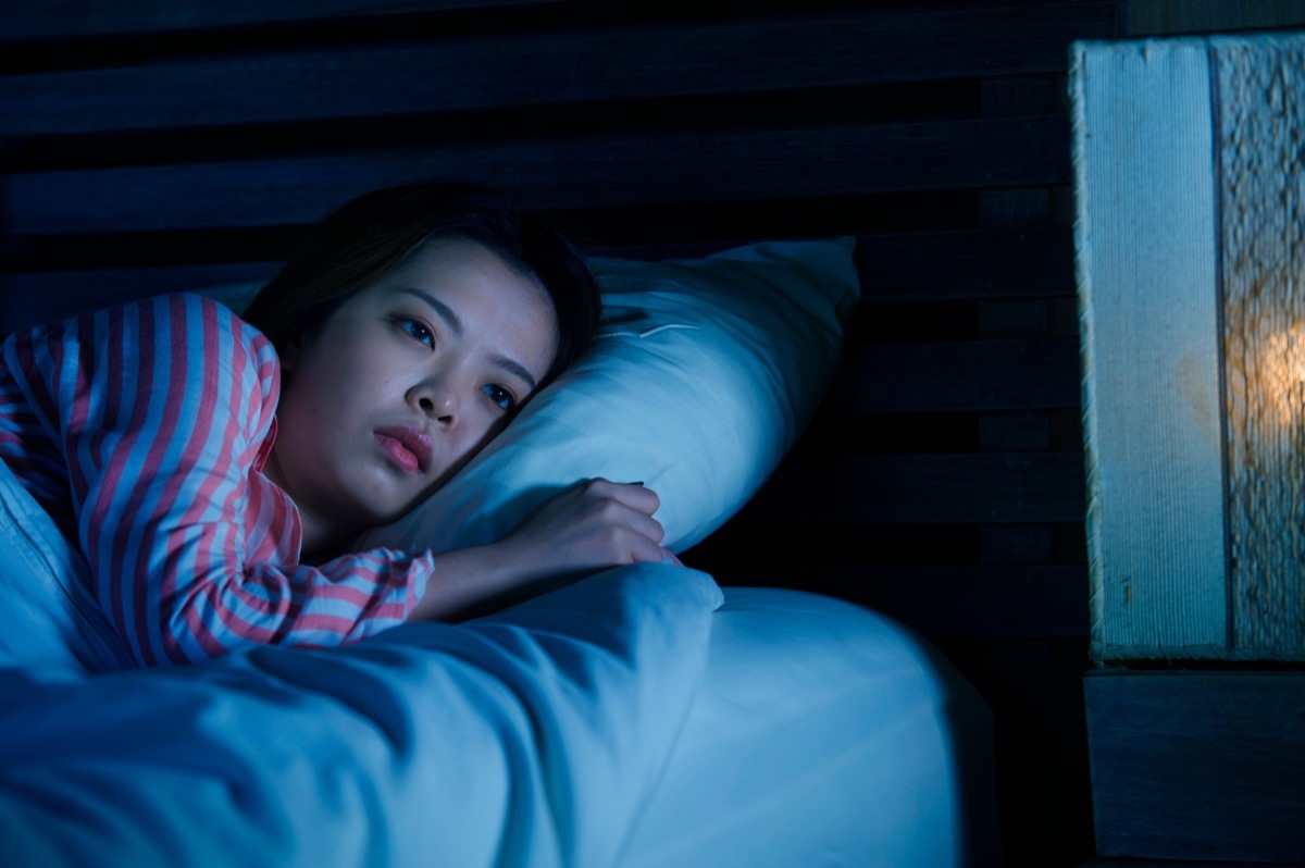 woman awake in bed with insomnia horrify sleep doctors