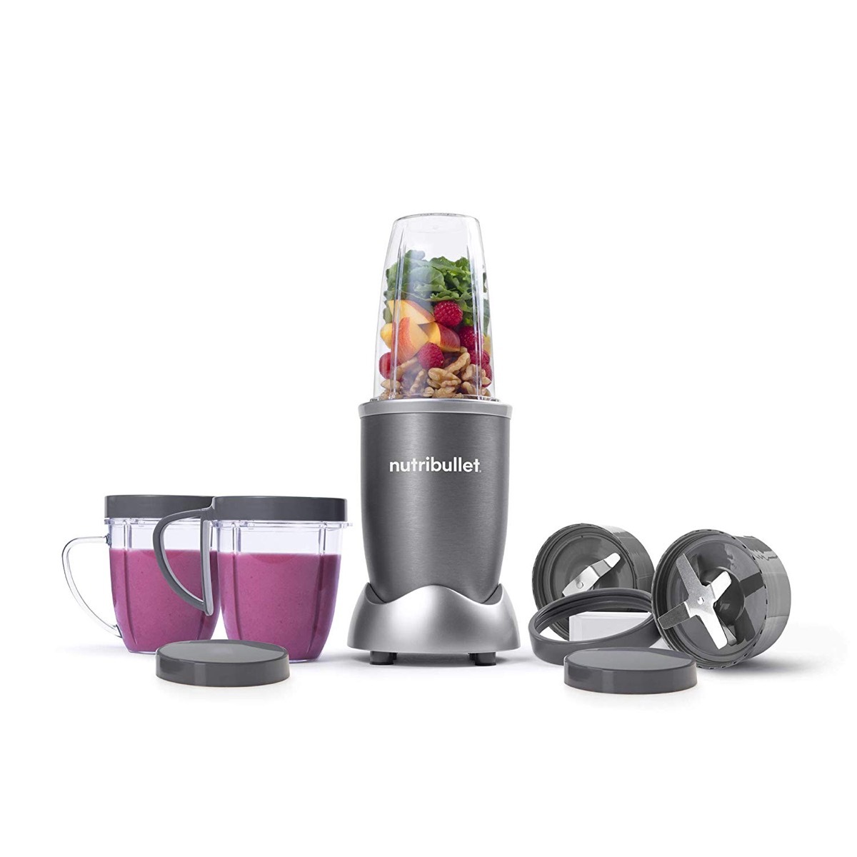 nutribullet blender with two cups, two blades, and additional lids