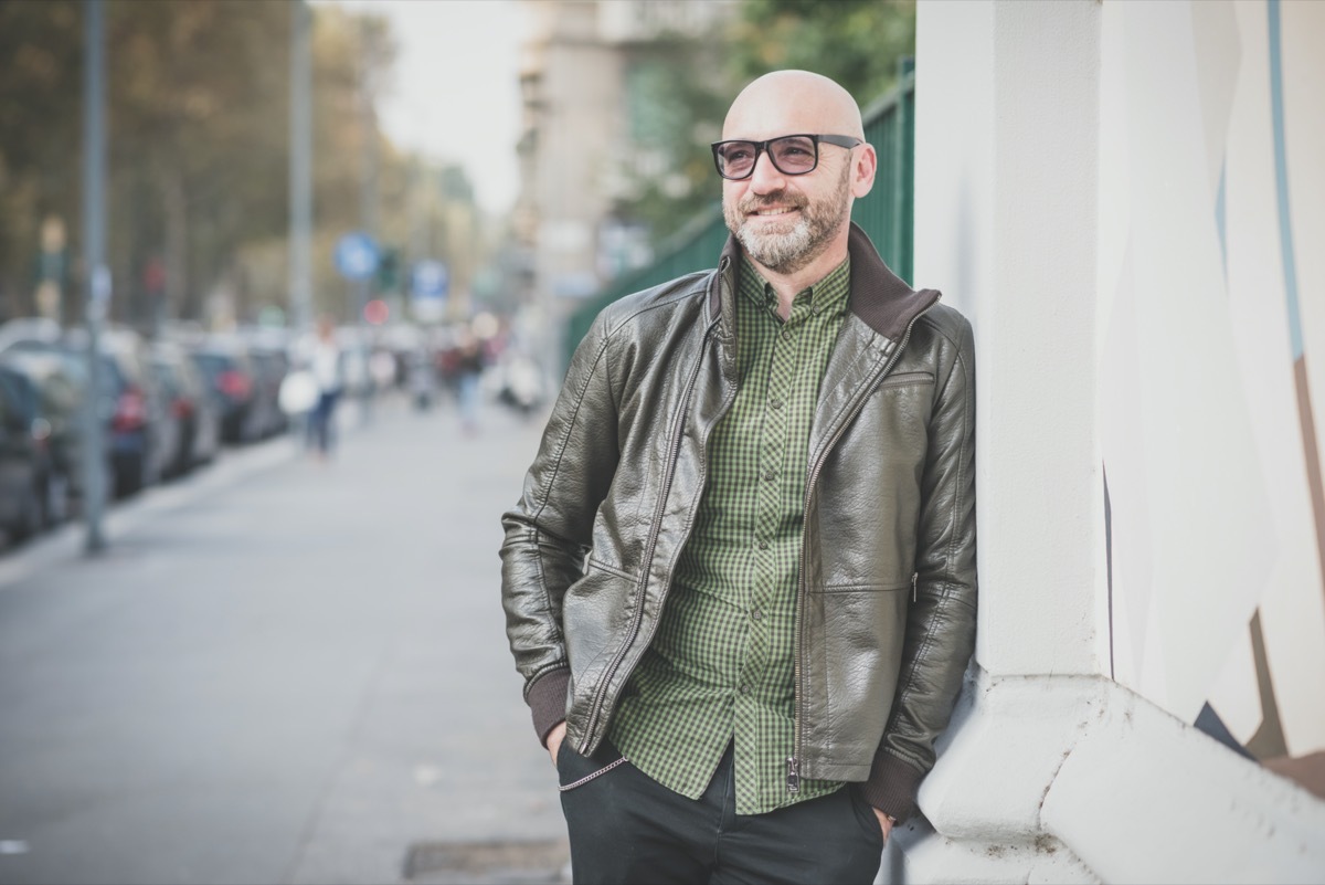 middle aged white man wearing green leather jacket