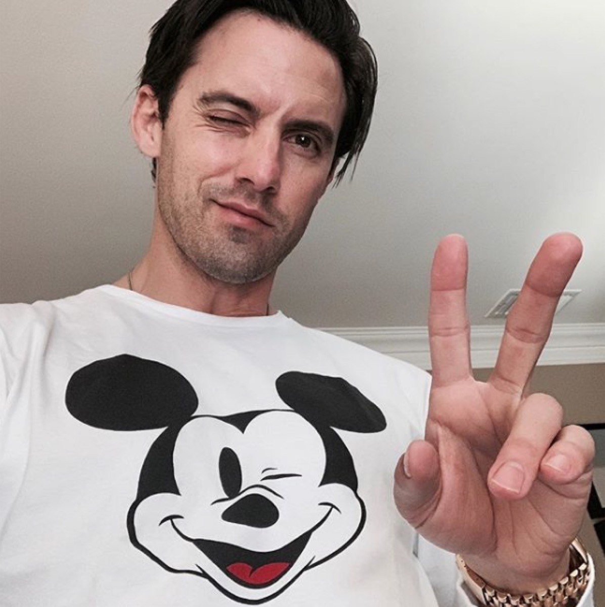 milo ventimiglia wearing a mickey mouse long sleeve shirt, disney celebs
