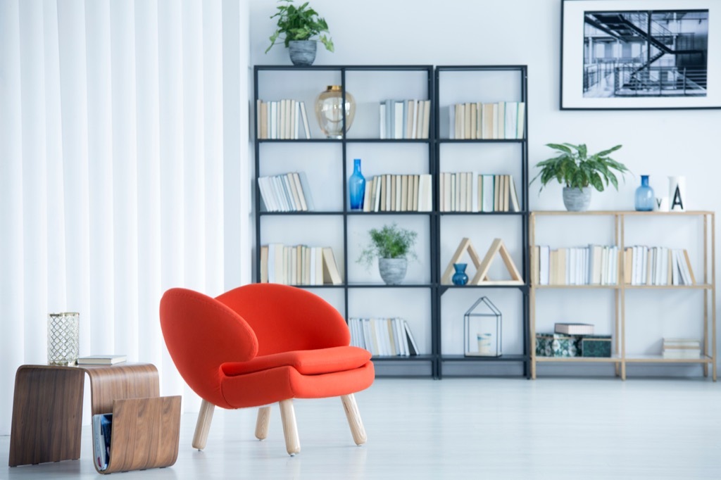 bookshelf in a white light living room