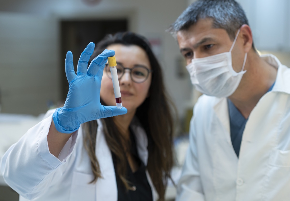 Doctors analyzing medical samples in a lab